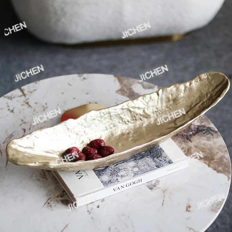 Small boat fruit plate ornament high-end light luxury living room modern model room dining table tray jewelry
Small boat fruit plate ornament high-end light luxury living room modern model room dining table tray jewelry