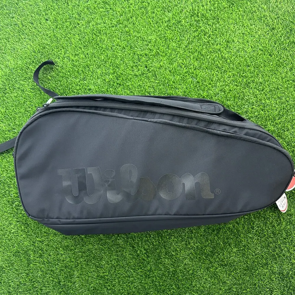 Wilson Noir Tour Tennis Backpack - Holds up to 12 Rackets large capacity tennis bag "Series Noir" Collection WR8029701001 
Wilson Noir Tour Tennis Backpack - Holds up to 12 Rackets large capacity tennis bag "Series Noir" Collection WR8029701001