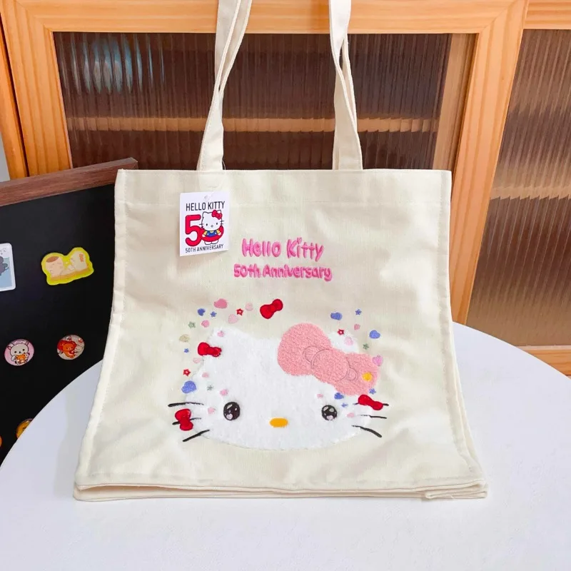 Sanrios Hellokitty Embroidered Canvas Bag Cartoon Pink Girl Handbag Student Tutoring One-shoulder Commuting Bag Birthday Gift
Sanrios Hellokitty Embroidered Canvas Bag Cartoon Pink Girl Handbag Student Tutoring One-shoulder Commuting Bag Birthday Gift