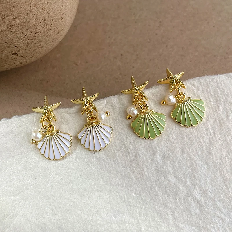 Real 925 Sterling Silver Enamel Starfis Shell 18K Gold Stud Earrings For Women Cute Fine Jewelry Small Niche Luxury Accessories
Real 925 Sterling Silver Enamel Starfis Shell 18K Gold Stud Earrings For Women Cute Fine Jewelry Small Niche Luxury Accessories