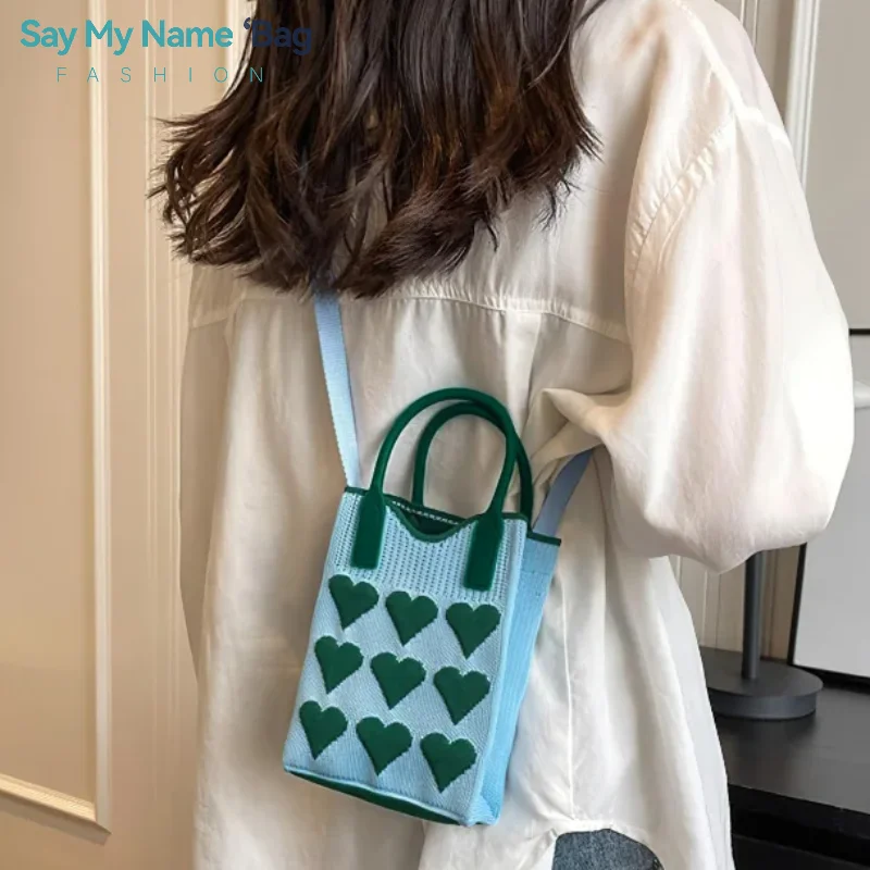 Candy Color Knitted Mini Mobile Phone Bag Heart Knitted Design Square Handbag Girls Cute Outdoor Shoulder Handbag and Hand Bag
Candy Color Knitted Mini Mobile Phone Bag Heart Knitted Design Square Handbag Girls Cute Outdoor Shoulder Handbag and Hand Bag