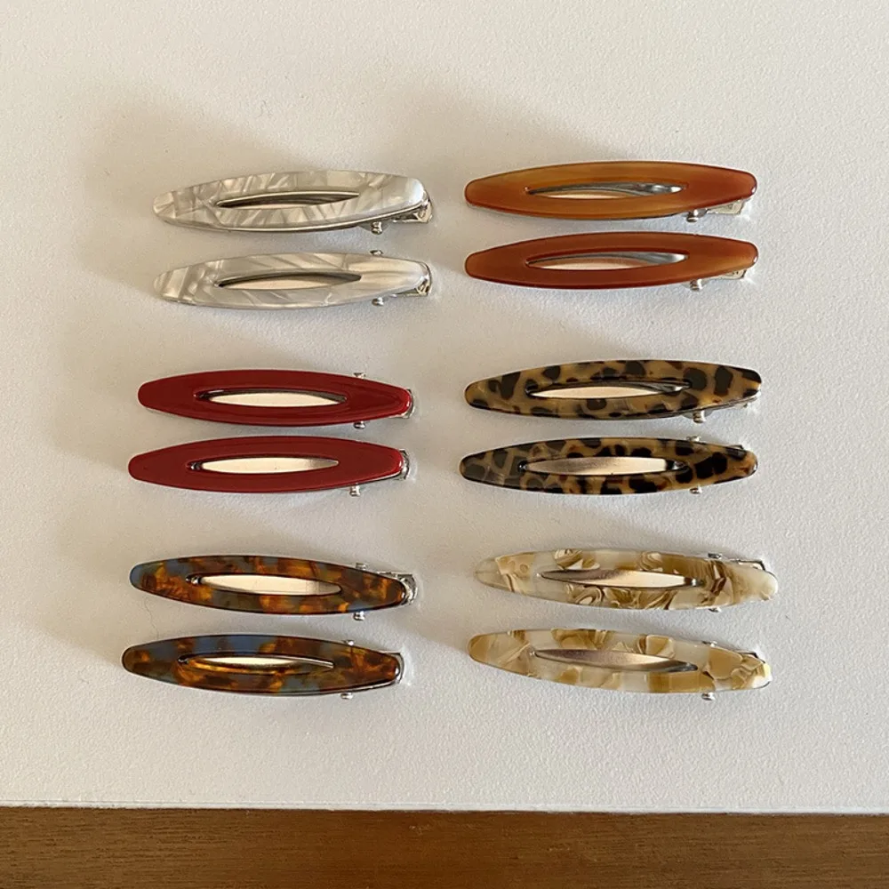 2Pcs Fashion Hollowed Hair Clips Oval Geometric Acetate Clip Sweet Bangs Clip Girls
2Pcs Fashion Hollowed Hair Clips Oval Geometric Acetate Clip Sweet Bangs Clip Girls