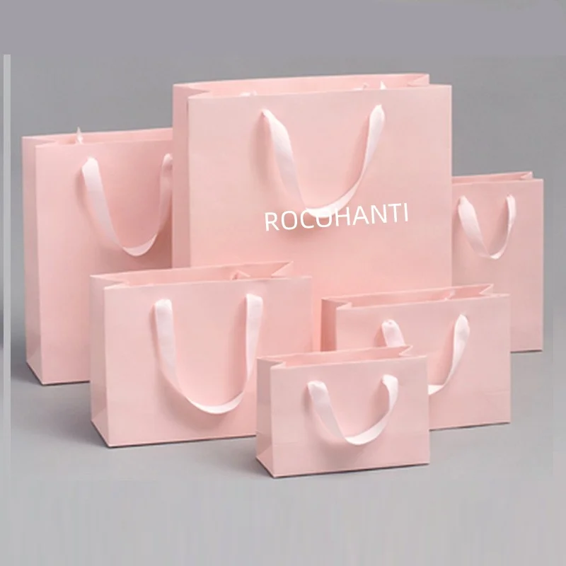 20pcs Wholesale Custom Logo Printing Light Deep Pink Paper Gift Bag With Ribbon Handle for Clothing Shoes Accessories Packaging
20pcs Wholesale Custom Logo Printing Light Deep Pink Paper Gift Bag With Ribbon Handle for Clothing Shoes Accessories Packaging