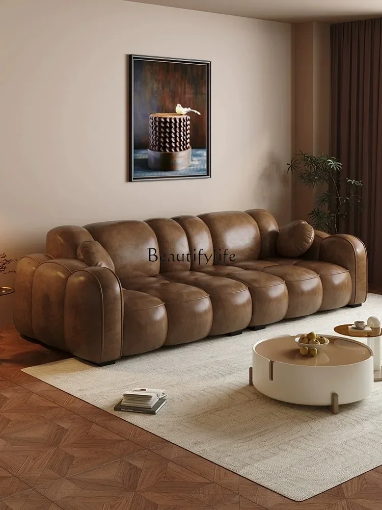 *Italian retro style oil wax leather sofa simple straight row caramel color biscuit sofa
*Italian retro style oil wax leather sofa simple straight row caramel color biscuit sofa