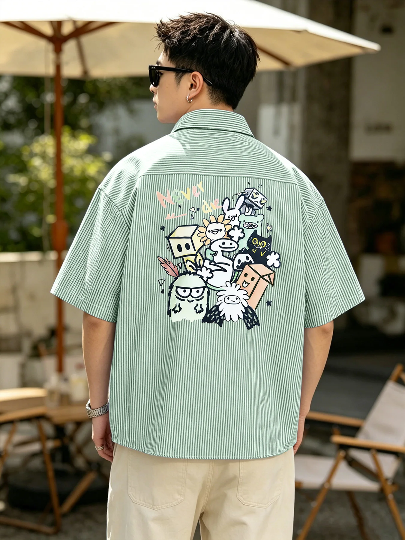 Korean-style trendy men's summer new versatile short-sleeve shirt with fun cartoon pattern and stripes
Korean-style trendy men's summer new versatile short-sleeve shirt with fun cartoon pattern and stripes