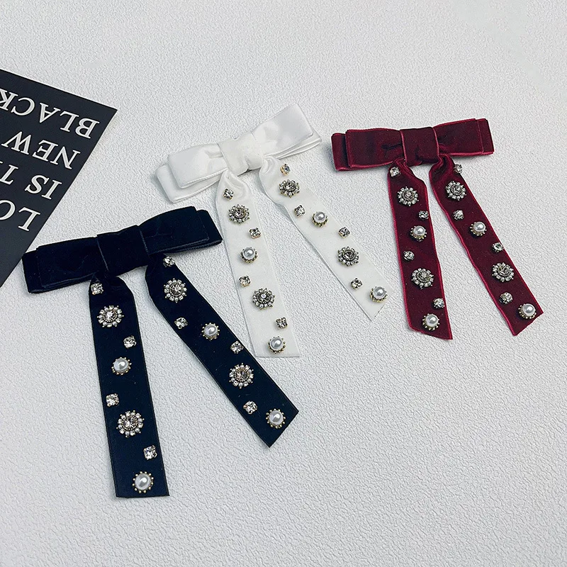 Korean Style Bow Hair Clip with Black Long Velvet Ribbon, Spring Clip Pearl Streamer - Fashionable Women's Hair Accessory
Korean Style Bow Hair Clip with Black Long Velvet Ribbon, Spring Clip Pearl Streamer - Fashionable Women's Hair Accessory