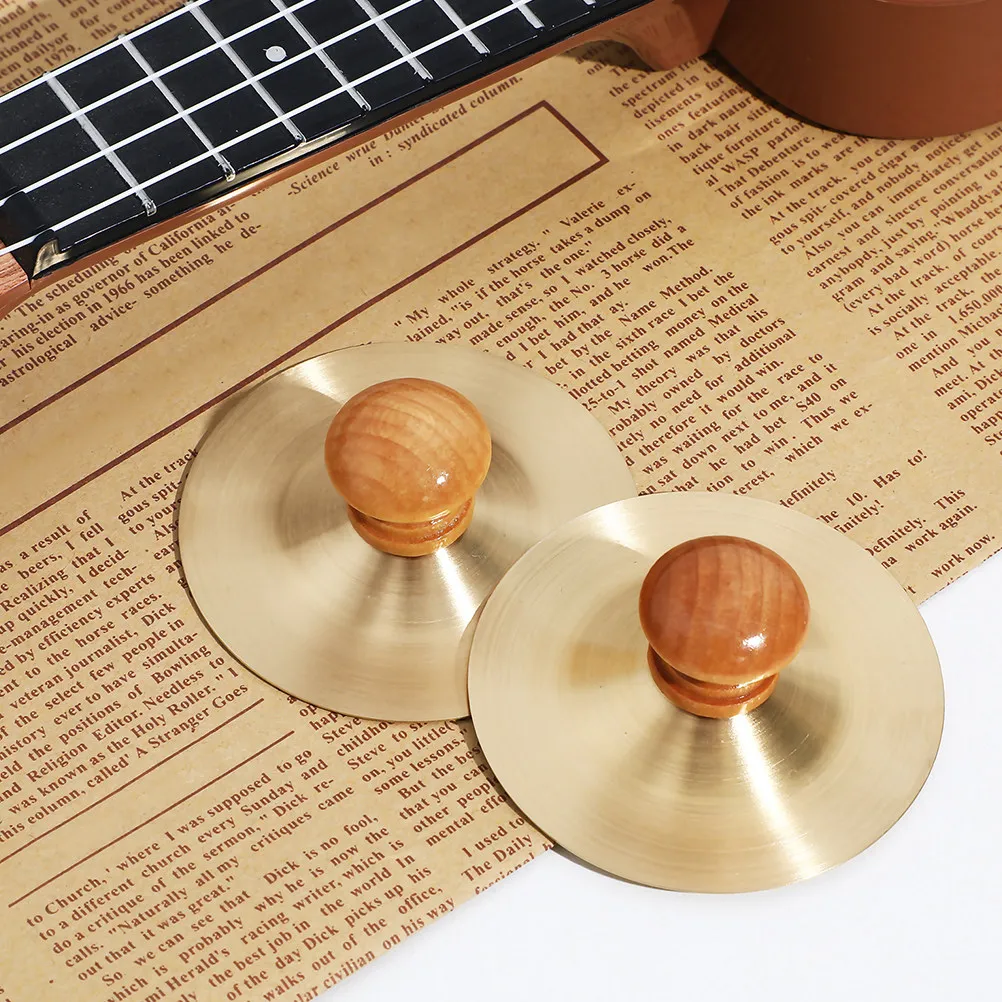 2Pcs Finger Cymbals Small Musical Instrument Sturdy Wood Copper Percussion Kids Hand Cymbals for Dance Parties Children's Music
2Pcs Finger Cymbals Small Musical Instrument Sturdy Wood Copper Percussion Kids Hand Cymbals for Dance Parties Children's Music