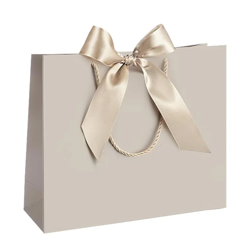 10pcs (5 Bags + 5 Ribbons) Elegant Beige Thank You Gift Bags, Paper Gift Bags, Shopping Bags with Golden Bows - Foldable
10pcs (5 Bags + 5 Ribbons) Elegant Beige Thank You Gift Bags, Paper Gift Bags, Shopping Bags with Golden Bows - Foldable