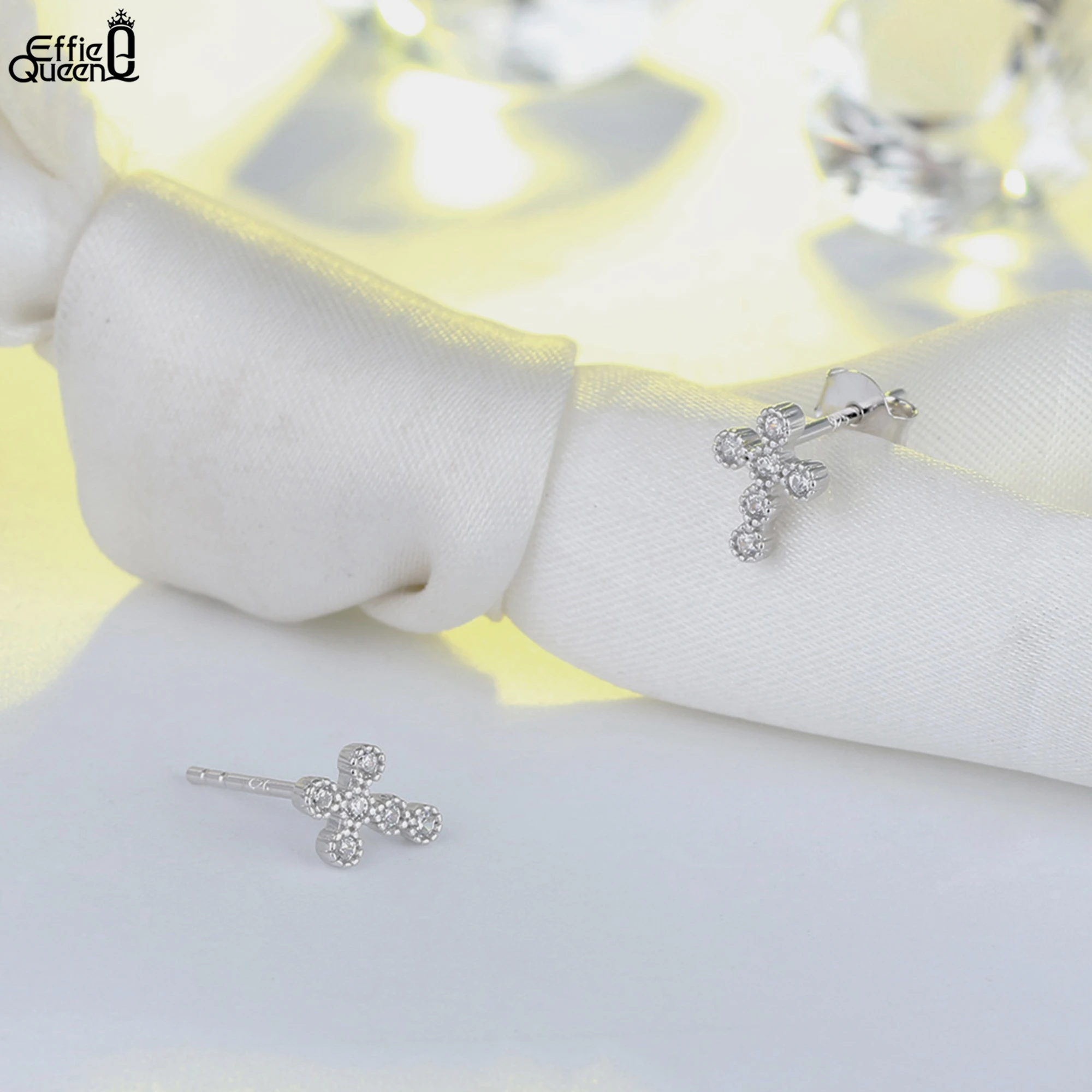 Effie Queen Vintage 925 Sterling Silver Cross Stud Earrings with Sparkling Oval-Cut Zirconia Chic and Religious Jewelry SE106
Effie Queen Vintage 925 Sterling Silver Cross Stud Earrings with Sparkling Oval-Cut Zirconia Chic and Religious Jewelry SE106