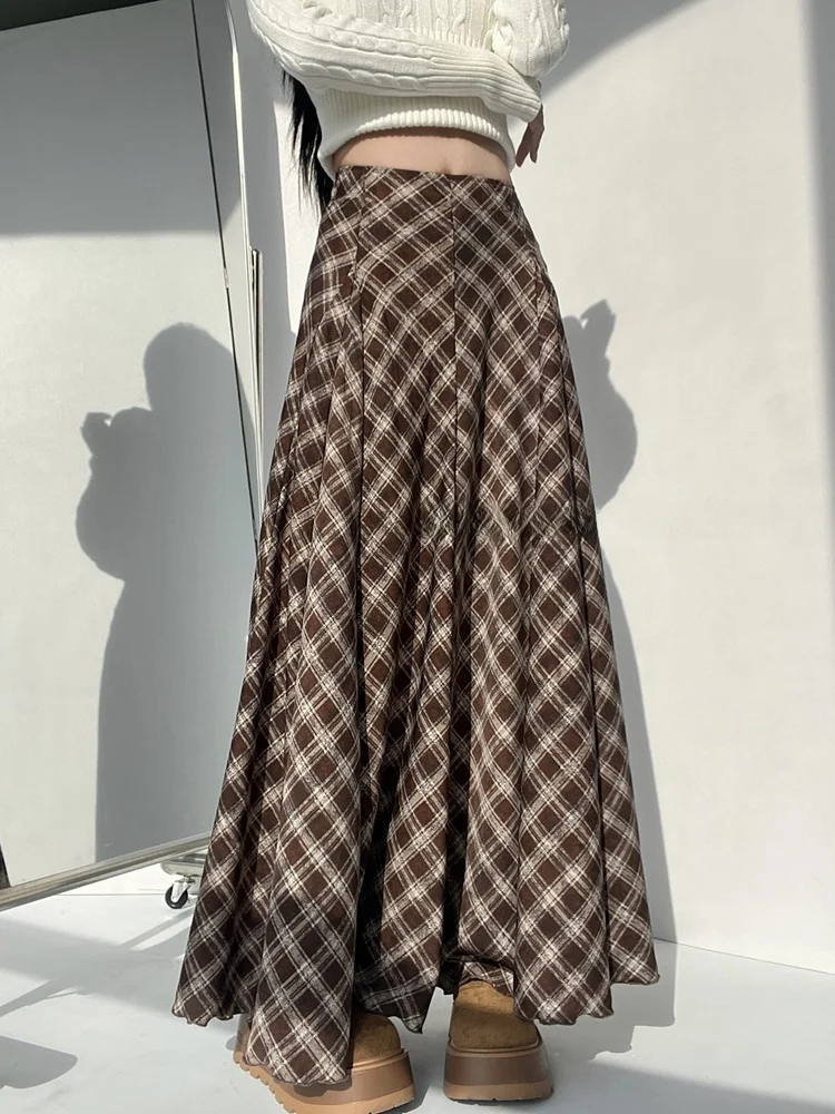 Коричневая клетчатая свободная женская юбка миди: осенне-зимний дизайн, ретро-стиль, высокая талия, А-силуэт, для повседневной носки
Коричневая клетчатая свободная женская юбка миди: осенне-зимний дизайн, ретро-стиль, высокая талия, А-силуэт, для повседневной носки