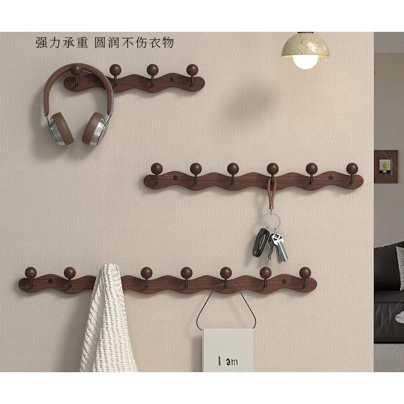 Solid wood hangers, wall-mounted door hangers, wall-free punching keys, clothes hooks
Solid wood hangers, wall-mounted door hangers, wall-free punching keys, clothes hooks