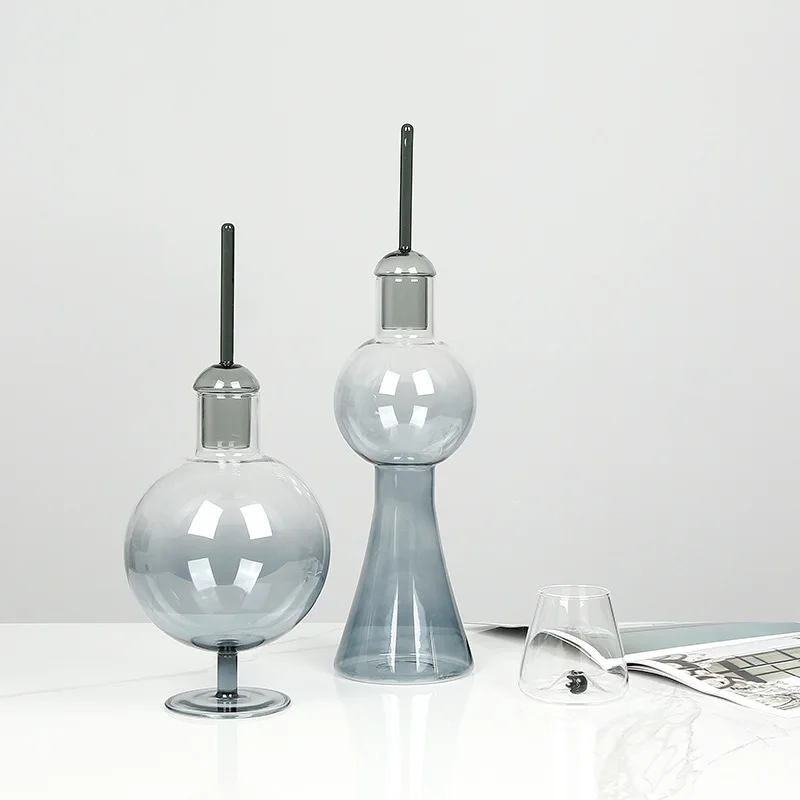 Modern minimalist transparent gradual change gray cone glass jar ornament, high-end home soft decoration
Modern minimalist transparent gradual change gray cone glass jar ornament, high-end home soft decoration