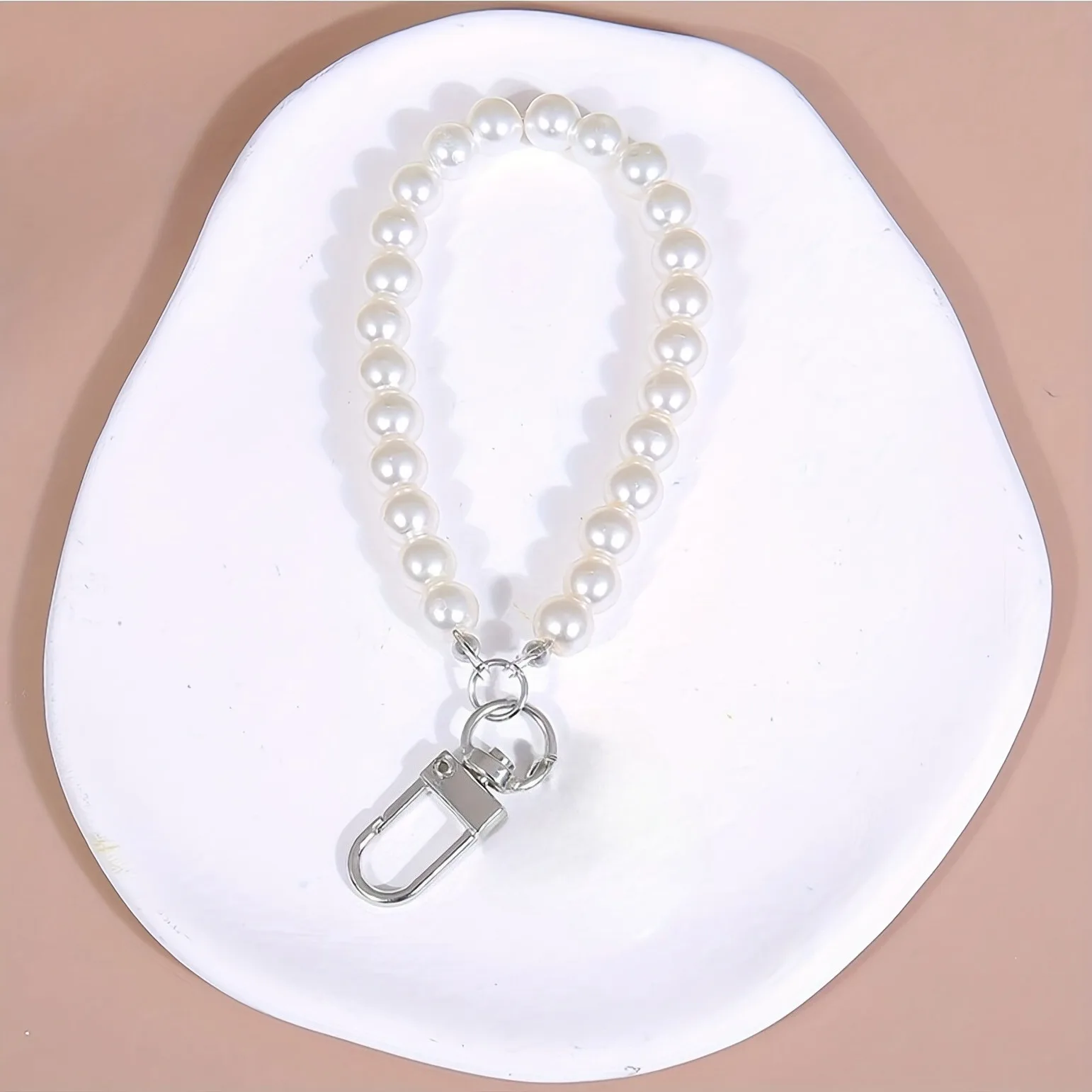 1PC Glass imitation pearl short chain bag charm phone case keychain pendant women's accessories
1PC Glass imitation pearl short chain bag charm phone case keychain pendant women's accessories
