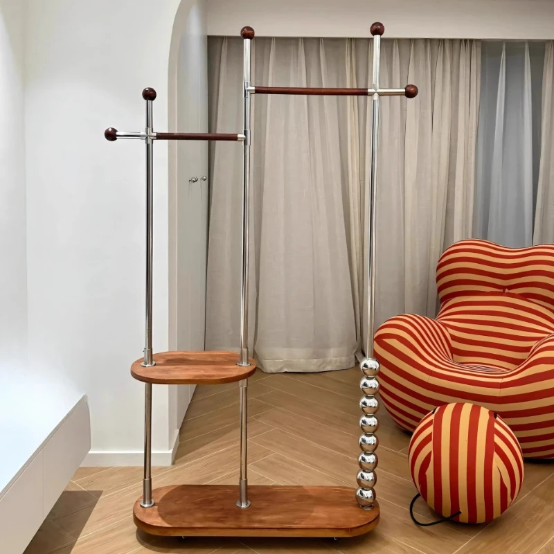 Household stainless steel hanger Solid wood medieval floor coat rack Movable multi-functional hanger with wheels
Household stainless steel hanger Solid wood medieval floor coat rack Movable multi-functional hanger with wheels