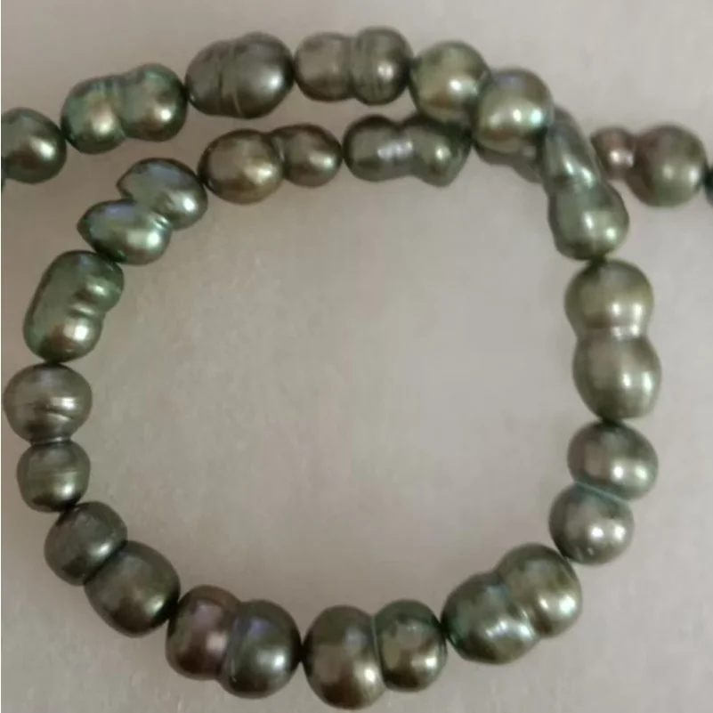 17” 12x18mm Genuine Natural Black Green Baroque Pearl Necklace & Large Pearls & Sterling Silver Clasp
17” 12x18mm Genuine Natural Black Green Baroque Pearl Necklace & Large Pearls & Sterling Silver Clasp