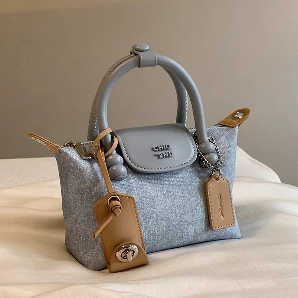 Tote Bag Women's 2025 New Handbag Office Small Handbag Crossbody Bag Dumplings Longxiang Leisure Versatile Key Wallet
Tote Bag Women's 2025 New Handbag Office Small Handbag Crossbody Bag Dumplings Longxiang Leisure Versatile Key Wallet