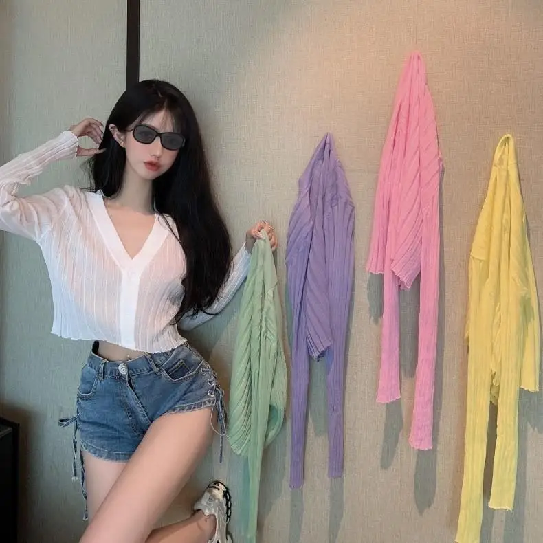 V-Neck Ice Silk Sun Protection Jacket Long Sleeve Casual Style Women's Knitted Sweater Ultra-Thin Single Piece Summer 2023
V-Neck Ice Silk Sun Protection Jacket Long Sleeve Casual Style Women's Knitted Sweater Ultra-Thin Single Piece Summer 2023