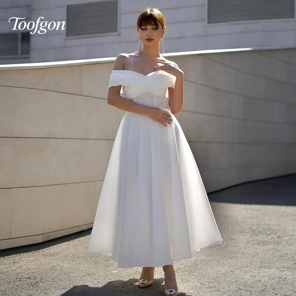 Toofgon Customized Off Shoulder A Line Short Wedding Dresses Organza Bride Gown Tea Length Draped Organza Bridal Party Dress
Toofgon Customized Off Shoulder A Line Short Wedding Dresses Organza Bride Gown Tea Length Draped Organza Bridal Party Dress
