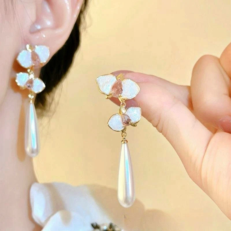 925 Silver Needle Korean Fashion Long Pearl Drop Earrings For Women Jewelry 2026 Trending Vintage Pink Crystal Flower Earrings
925 Silver Needle Korean Fashion Long Pearl Drop Earrings For Women Jewelry 2026 Trending Vintage Pink Crystal Flower Earrings