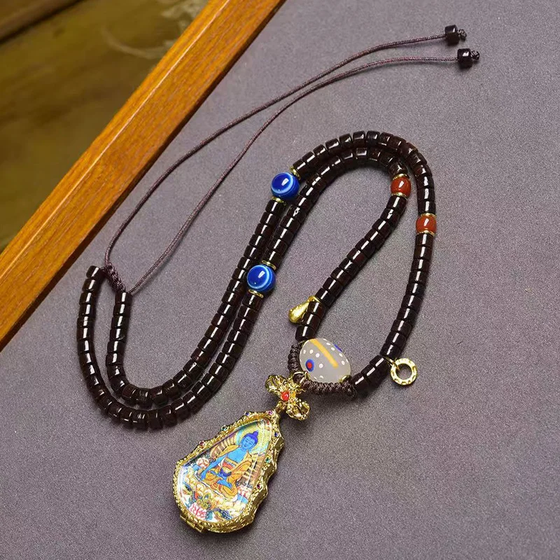 Natural Coconut Clavicle Adjustable Medicine Buddha Thangka Pendant Sweater Chain Necklace
Natural Coconut Clavicle Adjustable Medicine Buddha Thangka Pendant Sweater Chain Necklace