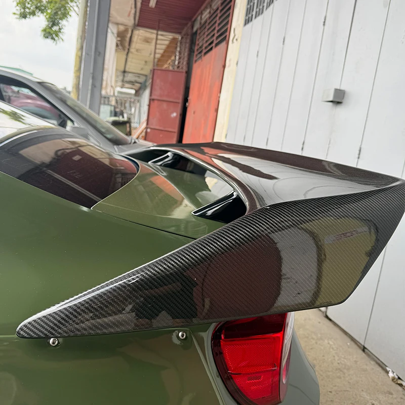 GT with bright black carbon fiber rear wing spoiler carbon fiber trunk cover spoiler rear wing
GT with bright black carbon fiber rear wing spoiler carbon fiber trunk cover spoiler rear wing