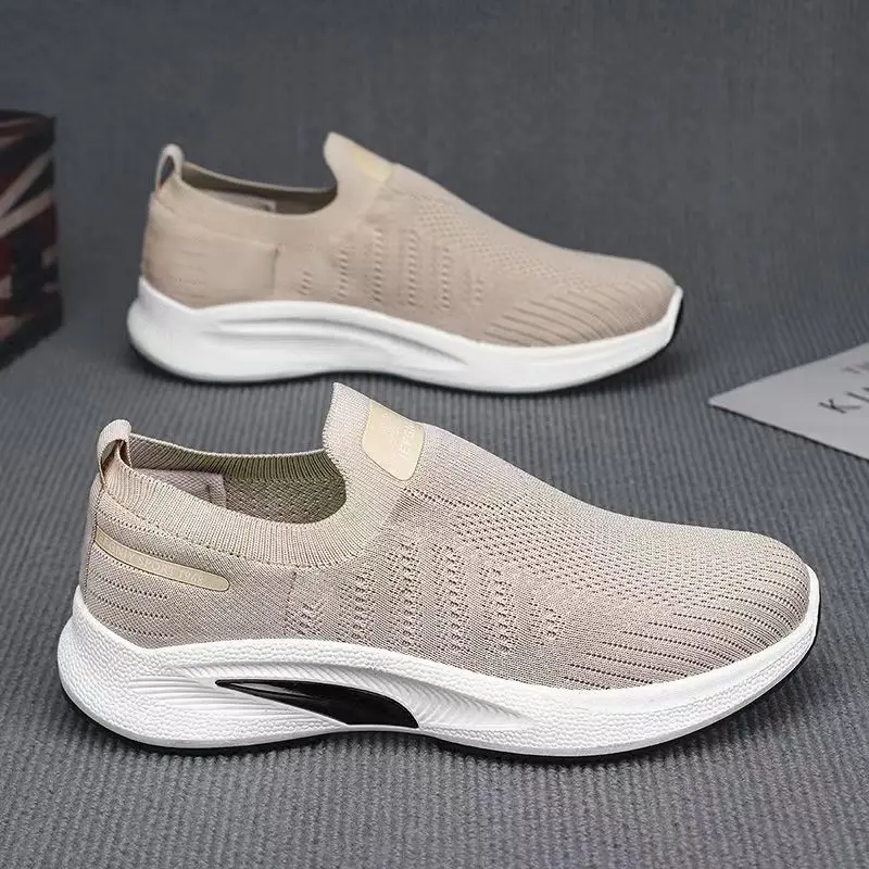 Мужская весенне-летняя новая повседневная спортивная обувь с сеткой, дышащая легкая прогулочная обувь без шнуровки на мягкой подошве с круглым носком
Мужская весенне-летняя новая повседневная спортивная обувь с сеткой, дышащая легкая прогулочная обувь без шнуровки на мягкой подошве с круглым носком