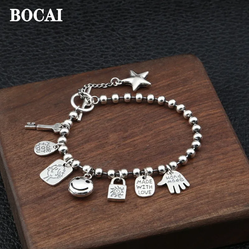 Ретро тайская кукла BOCAI из настоящего серебра S925 пробы с улыбающимся лицом, шар-ключ, квадратные карточки, буквы, Многоэлементный креативный женский браслет
Ретро тайская кукла BOCAI из настоящего серебра S925 пробы с улыбающимся лицом, шар-ключ, квадратные карточки, буквы, Многоэлементный креативный женский браслет