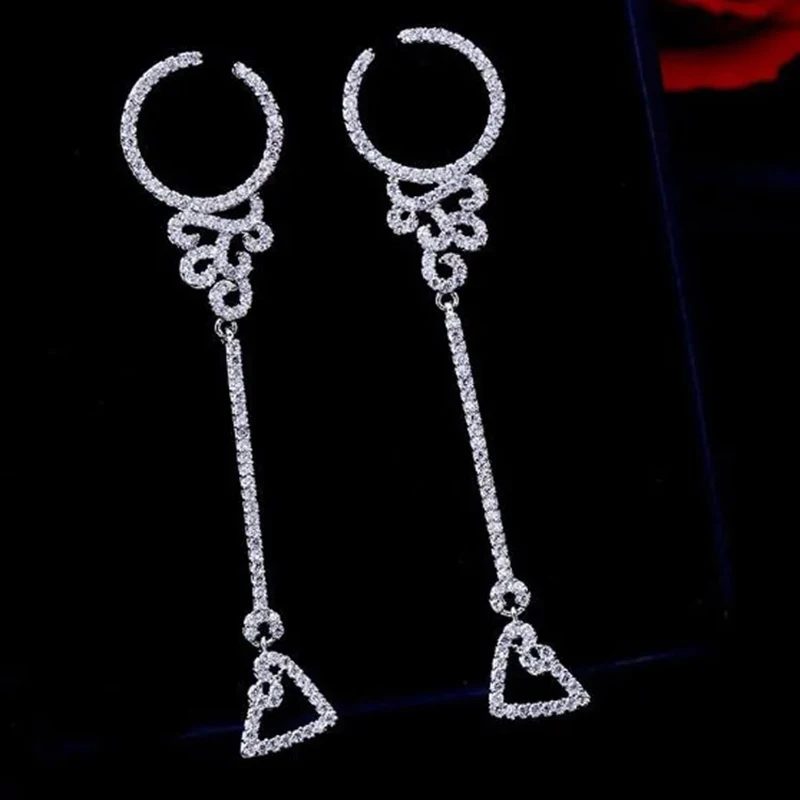 Серьги из стерлингового серебра 925 пробы с цирконом AAA, изысканные длинные висячие серьги в цветочном стиле с бриллиантами, женские великолепные свадебные украшения
Серьги из стерлингового серебра 925 пробы с цирконом AAA, изысканные длинные висячие серьги в цветочном стиле с бриллиантами, женские великолепные свадебные украшения
