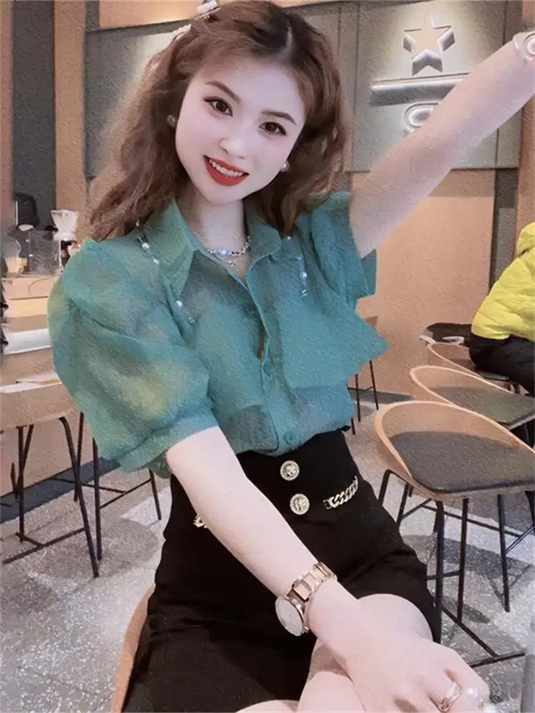 Fashionable Beaded Short-sleeved Shirt for Women in Summer Slim Casual POLO Collar Button Cardigan
Fashionable Beaded Short-sleeved Shirt for Women in Summer Slim Casual POLO Collar Button Cardigan