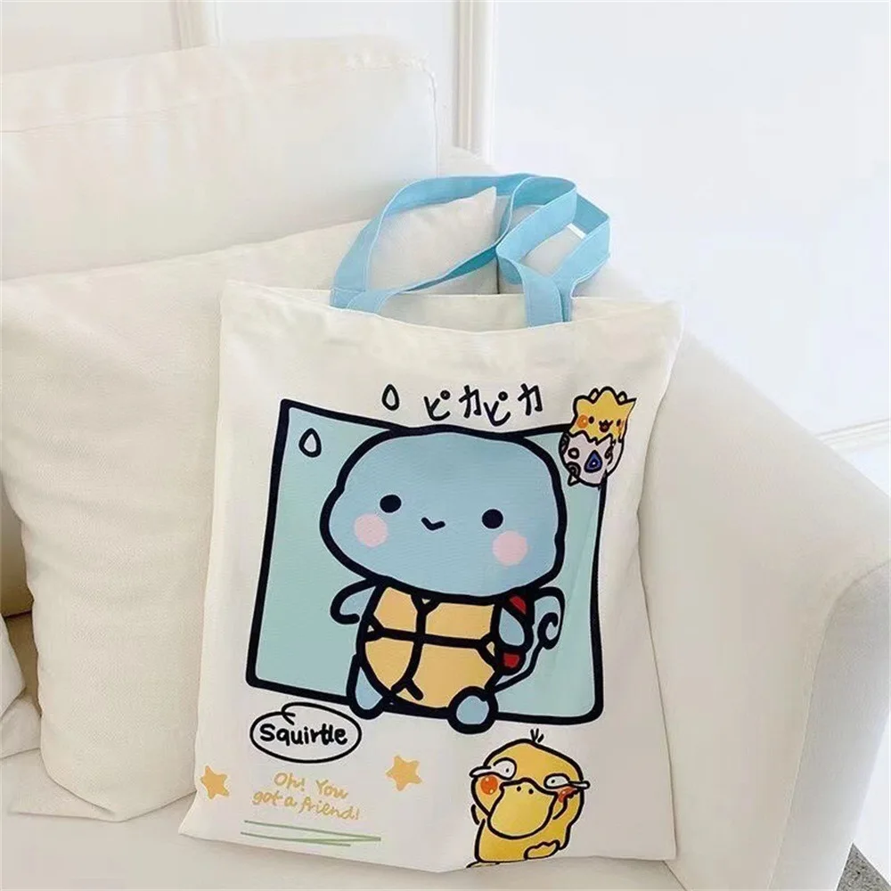 Anime Pokemon Pikachu Canvas Shoulder Bags Psyduck Squirtle Ladies Casual Handbag Reusable Large Capacity Women Shopping Bag TOY
Anime Pokemon Pikachu Canvas Shoulder Bags Psyduck Squirtle Ladies Casual Handbag Reusable Large Capacity Women Shopping Bag TOY