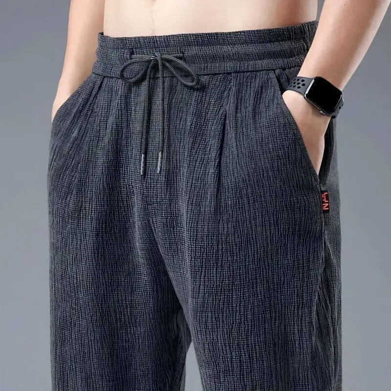 Ice Silk Casual Pants Men's Loose Straight Cut Quick Dry Summer Thin Cotton Linen Sports Trousers Fashionable Urban Style
Ice Silk Casual Pants Men's Loose Straight Cut Quick Dry Summer Thin Cotton Linen Sports Trousers Fashionable Urban Style