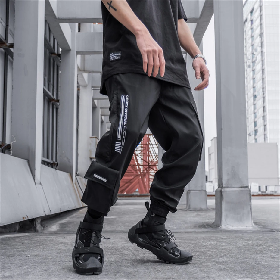 2025 Tactical Cargo Pants Men Fashion Multi Pocket Joggers Pant Functional Elastic Waist Hip Hop Streetwear Paratrooper Trousers
2025 Tactical Cargo Pants Men Fashion Multi Pocket Joggers Pant Functional Elastic Waist Hip Hop Streetwear Paratrooper Trousers