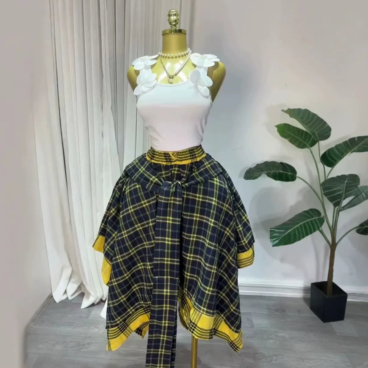 Summer Women Y2K Skirt High Waist Plaid Casual Skirts Asymmetrical Tie Waist A Line Skirt Ruffle Trim Yellow Plaid Midi Skirt
Summer Women Y2K Skirt High Waist Plaid Casual Skirts Asymmetrical Tie Waist A Line Skirt Ruffle Trim Yellow Plaid Midi Skirt