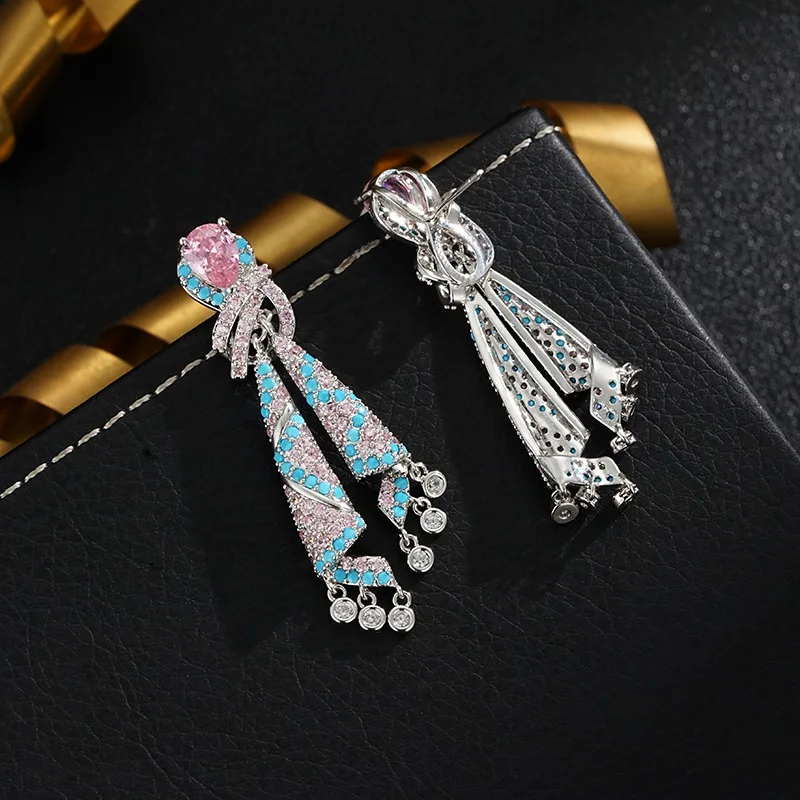 Pink drop-shaped Tang Dynasty silk earrings European and American exaggerated design zircon micro-encrusted earrings
Pink drop-shaped Tang Dynasty silk earrings European and American exaggerated design zircon micro-encrusted earrings