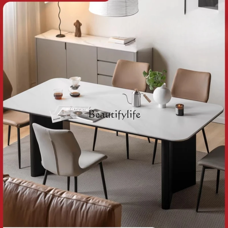 Solid wood rock slab dining table Italian home black simple designer light luxury high-end table
Solid wood rock slab dining table Italian home black simple designer light luxury high-end table