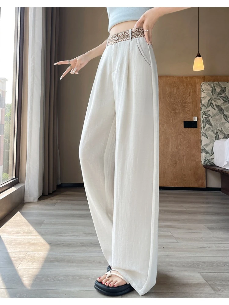 Embroidered design sense suit pants women in summer new thin style fashion commuting hanging feel ice silk wide leg pants
Embroidered design sense suit pants women in summer new thin style fashion commuting hanging feel ice silk wide leg pants