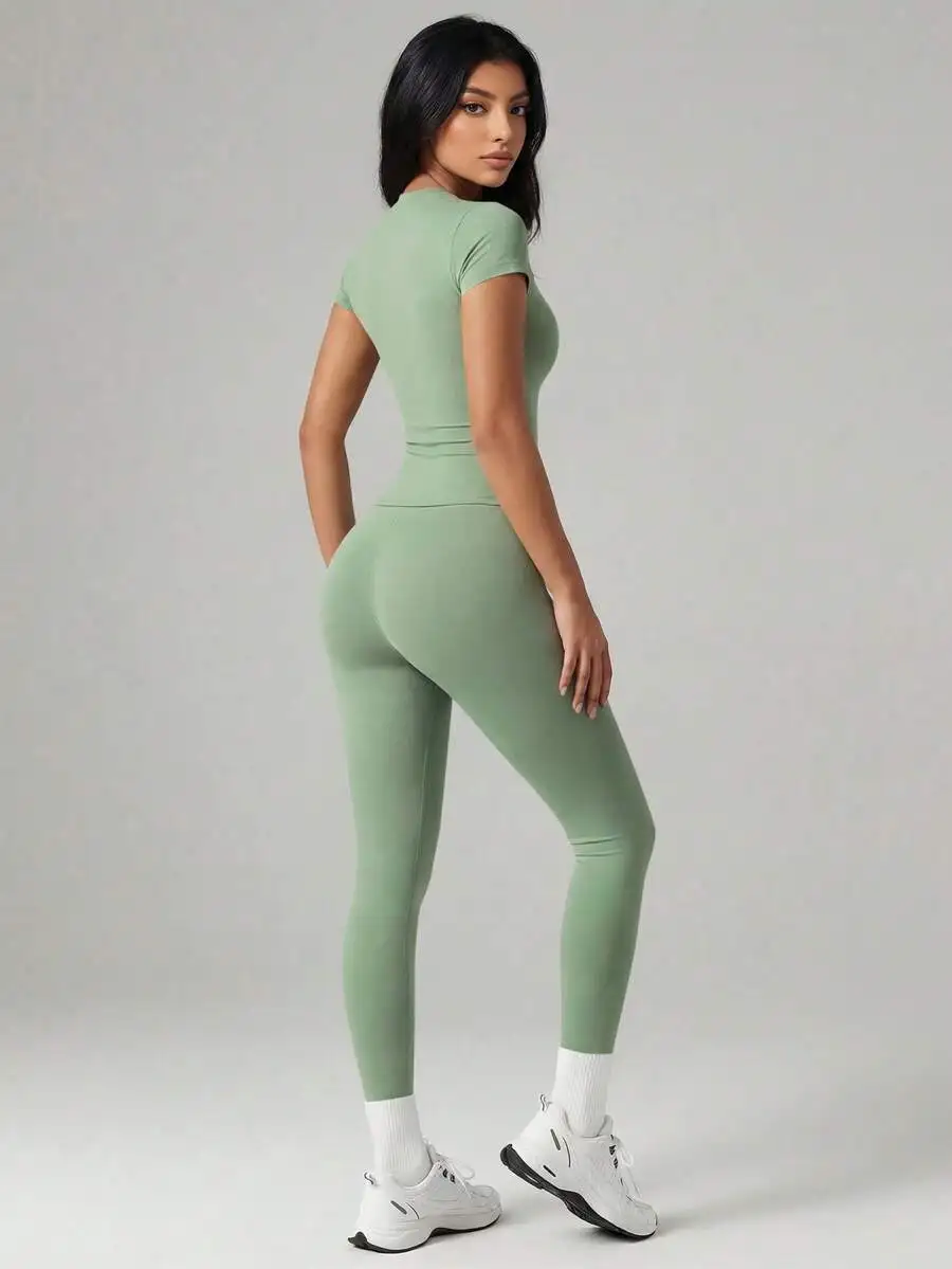 Womens Crew Neck Short Sleeve Top And High Waisted Yoga Sports Pants Set
Womens Crew Neck Short Sleeve Top And High Waisted Yoga Sports Pants Set