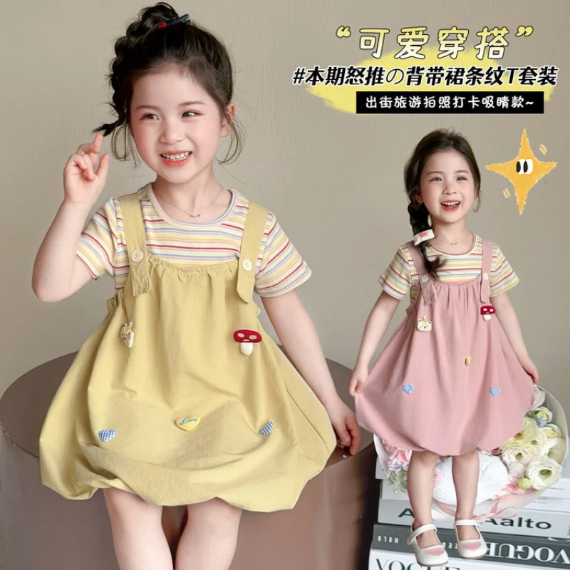 Korean-style short-sleeved suspender dress2026New girls' mushroom outfit, summer two-piece set for girls, casual and lightweight
Korean-style short-sleeved suspender dress2026New girls' mushroom outfit, summer two-piece set for girls, casual and lightweight