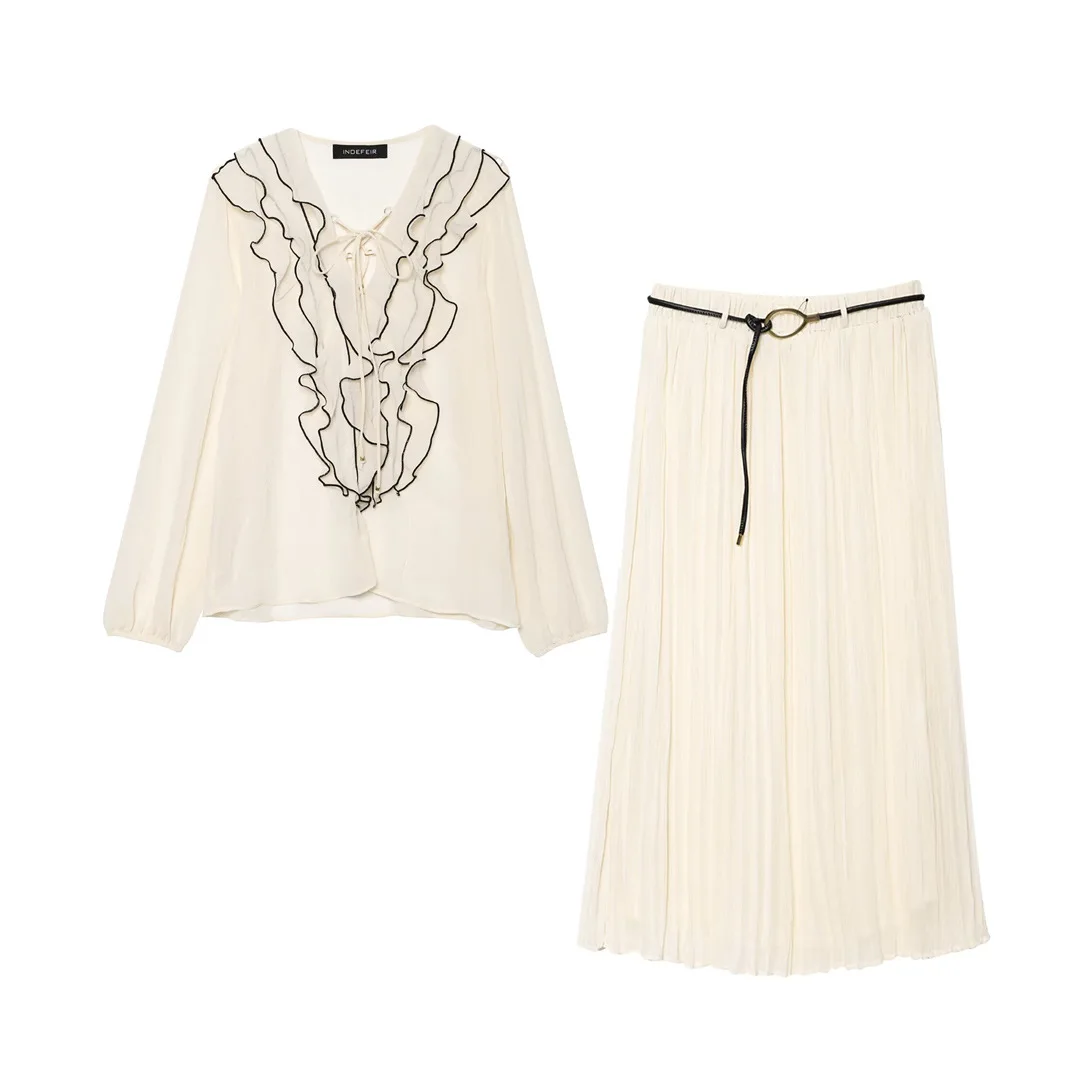 Лето 2025 г., новый комплект женской одежды, женский уличный стиль, повседневная свободная рубашка с длинными рукавами и украшением, длинная юбка до половины тела
Лето 2025 г., новый комплект женской одежды, женский уличный стиль, повседневная свободная рубашка с длинными рукавами и украшением, длинная юбка до половины тела