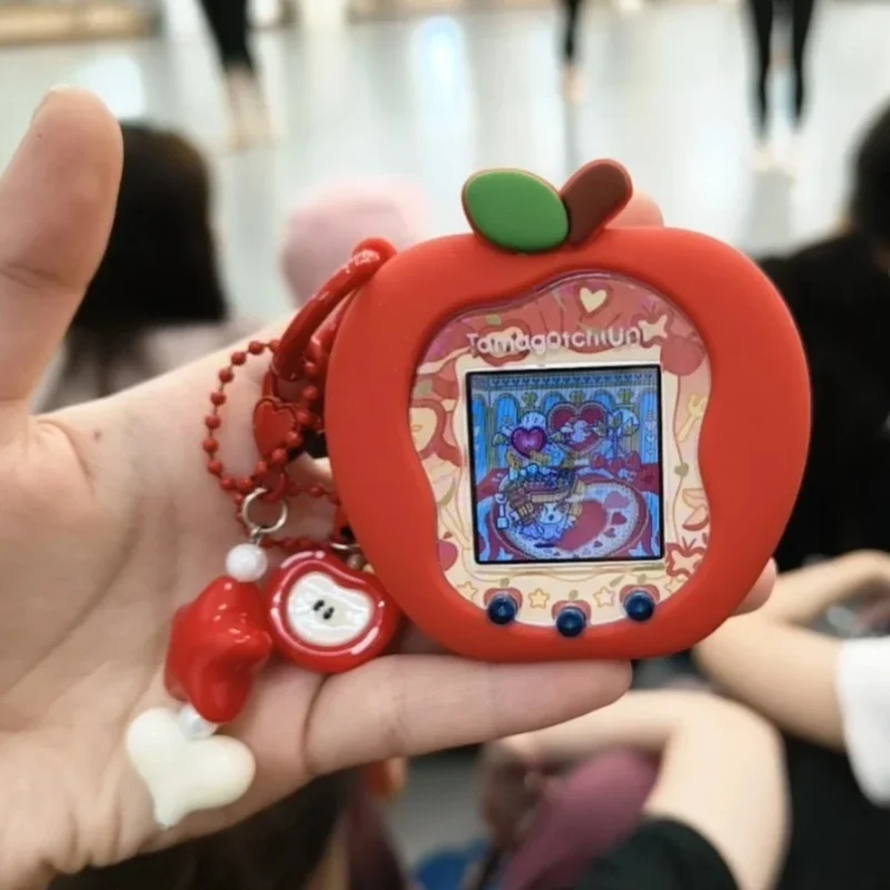В наличии Uni Uni Tamagotchi Electronic Pet Red Green Apple Силиконовый защитный чехол поставляется с панельной бумажной подвеской 
В наличии Uni Uni Tamagotchi Electronic Pet Red Green Apple Силиконовый защитный чехол поставляется с панельной бумажной подвеской
