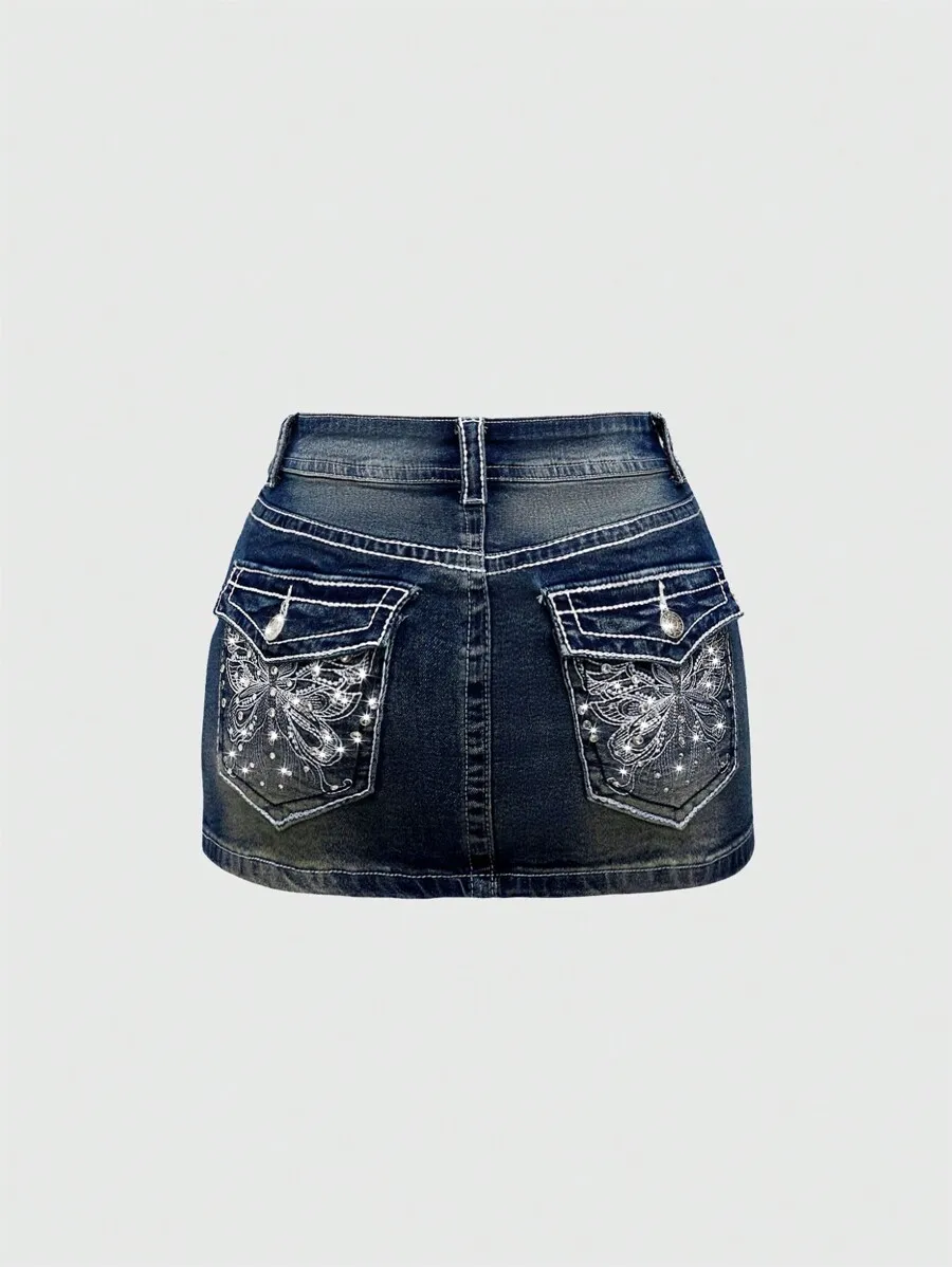 Low Waist Denim Mini Skirt with Embroidered Butterfly Pockets and Contrast Stitching
Low Waist Denim Mini Skirt with Embroidered Butterfly Pockets and Contrast Stitching
