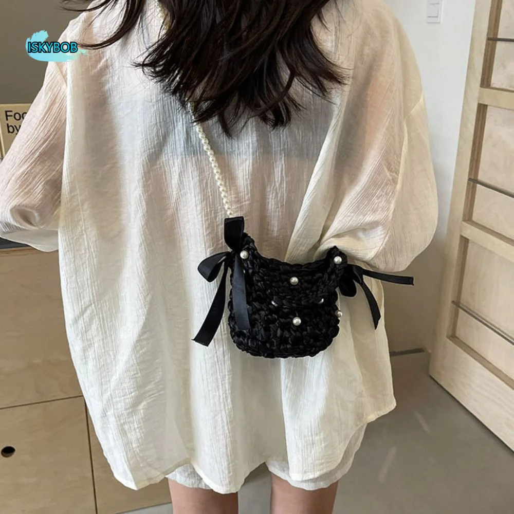 Simple Bow Weave Bag Solid Color Hollow Pearl Shoulder Bag Bucket Bag Countryside Style Beach Handbag Holiday
Simple Bow Weave Bag Solid Color Hollow Pearl Shoulder Bag Bucket Bag Countryside Style Beach Handbag Holiday