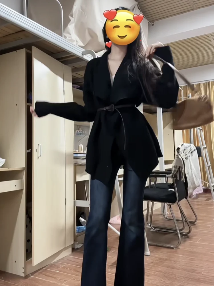 Korean High-End Black Knitted Sweater Coat Women's Autumn Winter Uneven Design Waist-Cinching Long Cardigan Warmth Heating
Korean High-End Black Knitted Sweater Coat Women's Autumn Winter Uneven Design Waist-Cinching Long Cardigan Warmth Heating