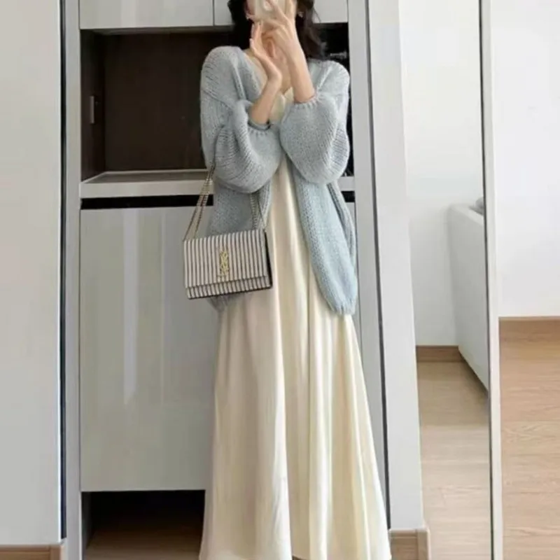 Свитер Нежный фонарь Мохеровое пальто Универсальный и ленивый свободный вязаный тонкий однотонный кардиган
Свитер Нежный фонарь Мохеровое пальто Универсальный и ленивый свободный вязаный тонкий однотонный кардиган