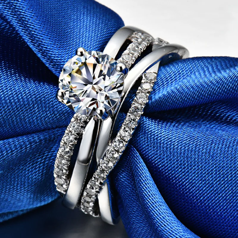 PT950Platinum twisted arm cross ring - engagement ring accessory
PT950Platinum twisted arm cross ring - engagement ring accessory