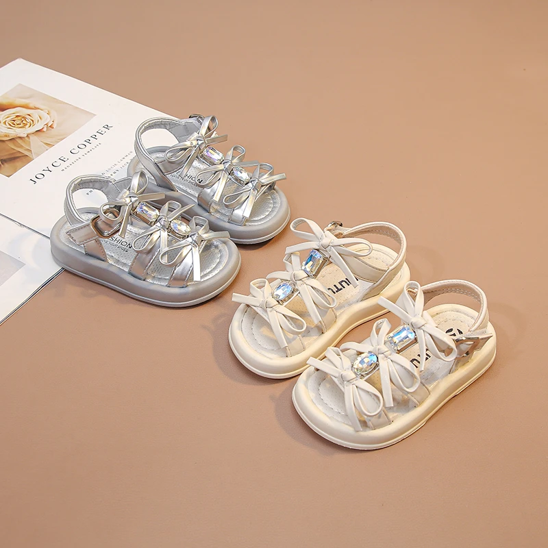 2026 summer new girls' sandals children's sweet bow opening beach shoes hollowed out sparkling diamond princess open toe sandals
2026 summer new girls' sandals children's sweet bow opening beach shoes hollowed out sparkling diamond princess open toe sandals