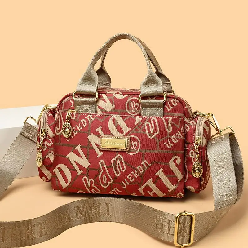 AS6616 2025 New Nylon Shoulder Bag Simple Mother Bag Portable Fashion High-end Canvas Middle-aged Women's Bag
AS6616 2025 New Nylon Shoulder Bag Simple Mother Bag Portable Fashion High-end Canvas Middle-aged Women's Bag
