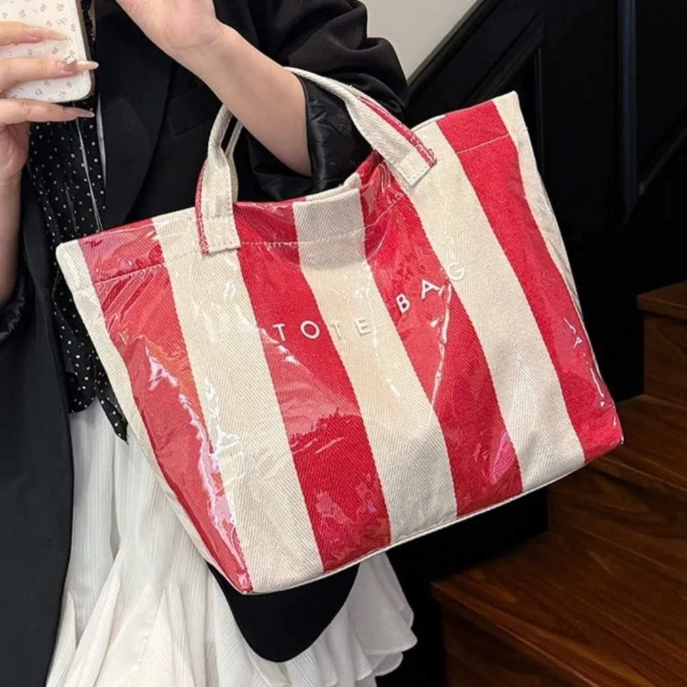 Waterproof Striped Tote Bag Large-Capacity Color-Blocked Design PVC Handbag Inner Zipper Pocket Fixed Shoulder Straps
Waterproof Striped Tote Bag Large-Capacity Color-Blocked Design PVC Handbag Inner Zipper Pocket Fixed Shoulder Straps