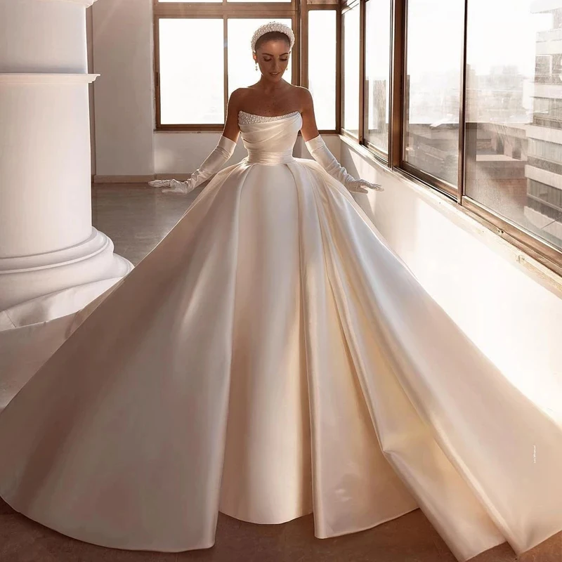 Elegant Pearls Wedding Dresses Modern Bridal Beach Boho Gowns Sweep Train Satin Ball Gown Plus Size Vestidos De Novia Customized
Elegant Pearls Wedding Dresses Modern Bridal Beach Boho Gowns Sweep Train Satin Ball Gown Plus Size Vestidos De Novia Customized