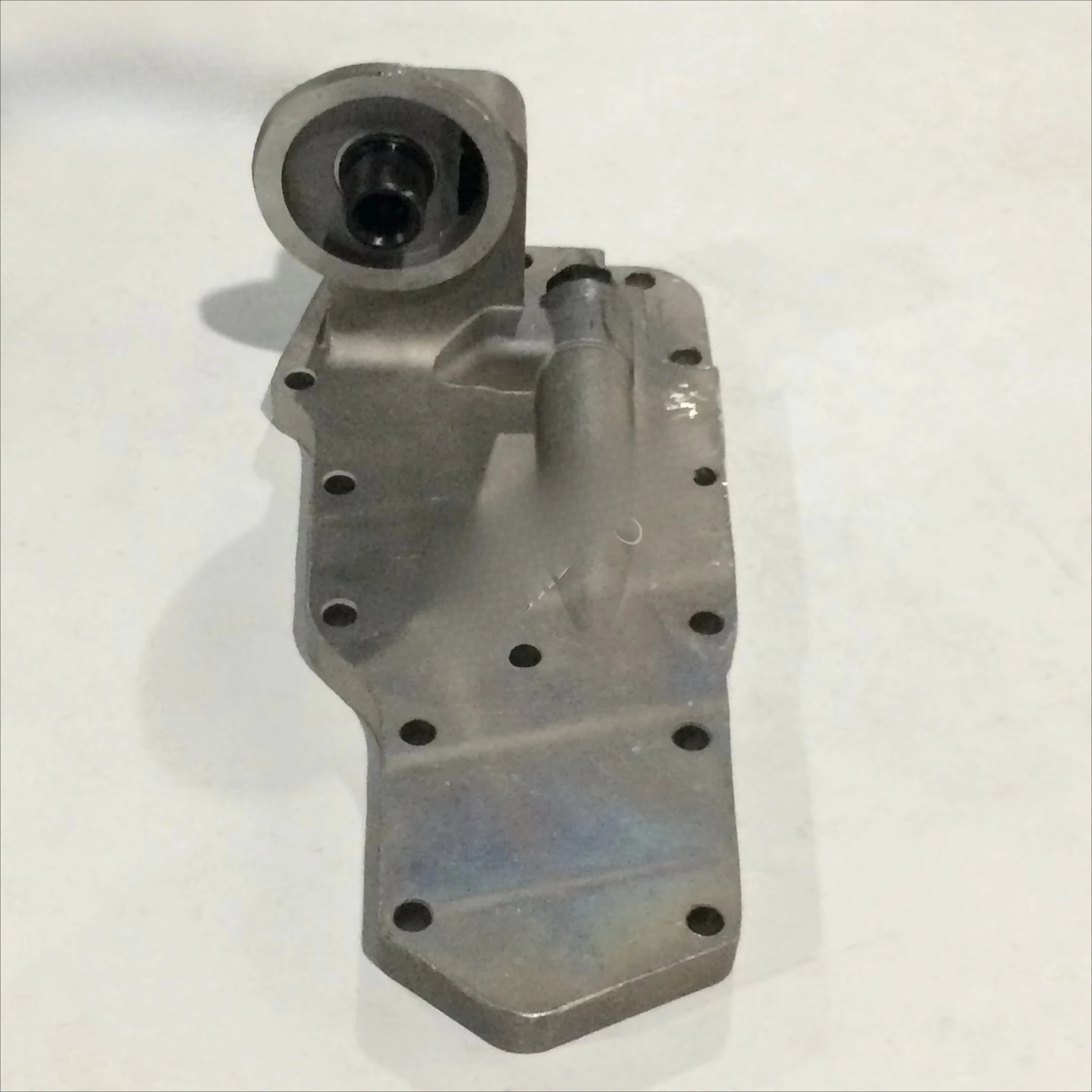 High quality PC200-6 6D102 5.9L 12v excavator parts oil filter support head cooler cover for construction machinery
High quality PC200-6 6D102 5.9L 12v excavator parts oil filter support head cooler cover for construction machinery